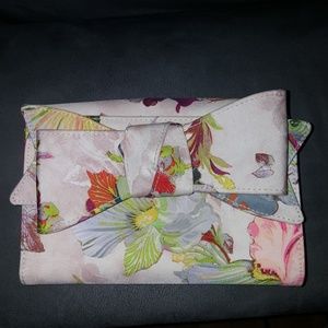 Super cute Floral print "Ted Baker" clutch.